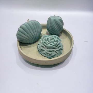 TEPSİ İÇERİSİNDE İSTİRİDYE, BURGU VE ŞAKAYIK ŞEKLİNDE MUM 